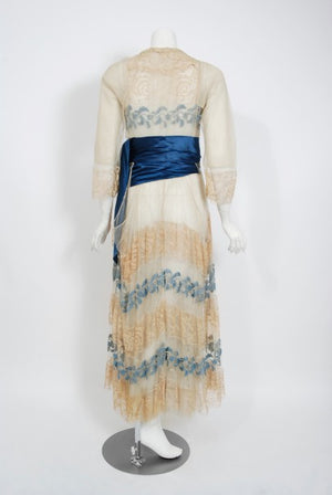 1910's Julius Garfinckel Couture Beige Embroidered Lace Blue Silk Sash Dress