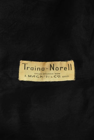 1956 Traina-Norell Couture Black Silk Belted Flounce Cocktail Dress