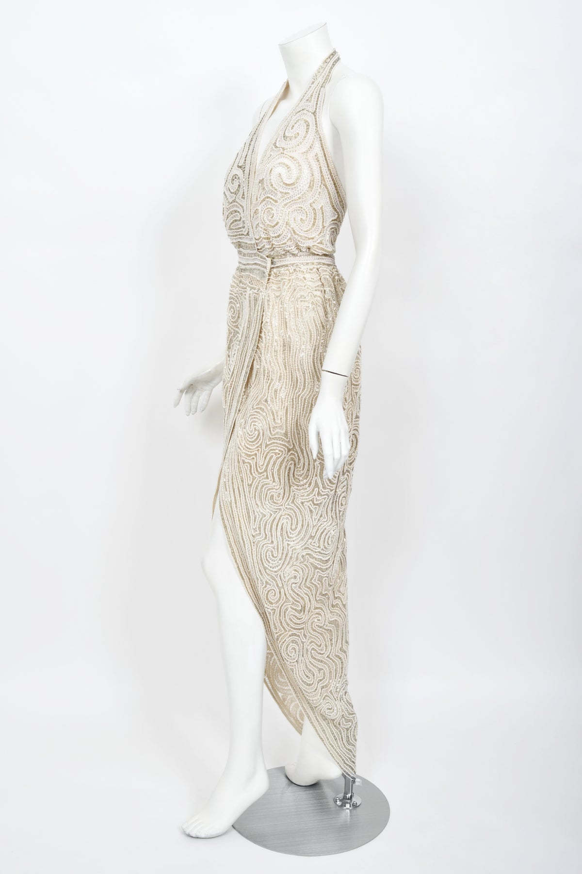 1970&#39;s Halston Couture Ivory Beaded Sheer Lace Backless Halter Wrap Gown