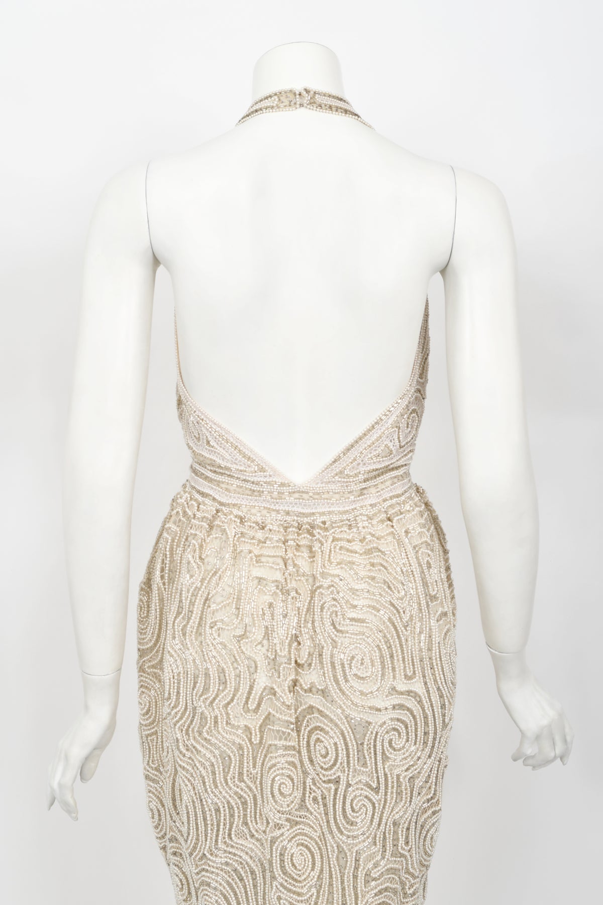 1970&#39;s Halston Couture Ivory Beaded Sheer Lace Backless Halter Wrap Gown