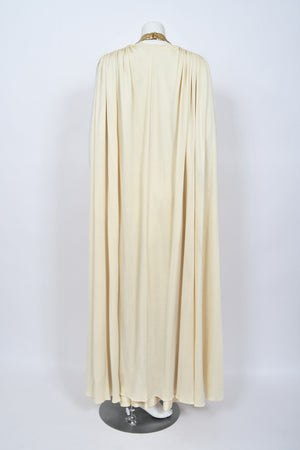 1972 Loris Azzaro Couture Ivory Silk-Jersey & Gold Metal Mesh Backless Gown w/ Cape