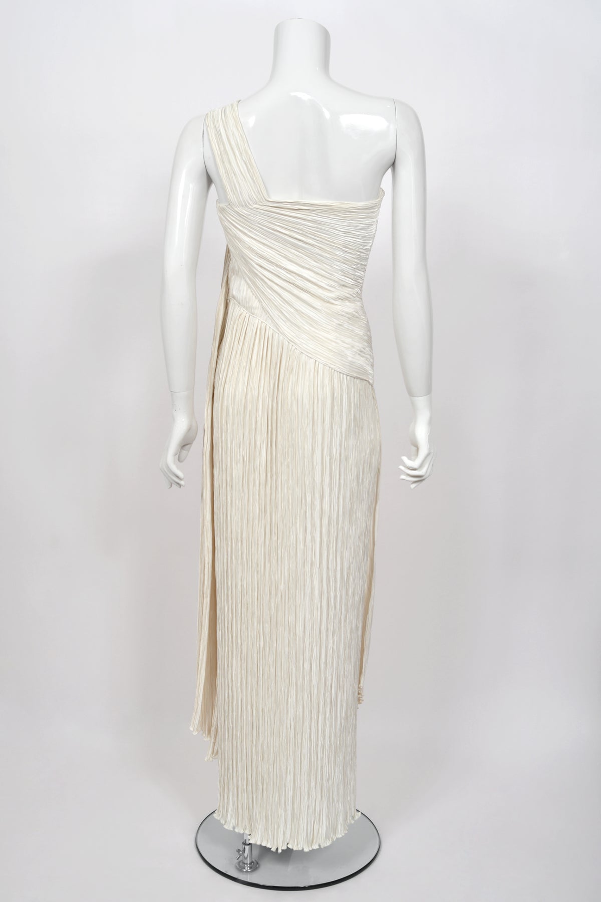 1983 Mary McFadden Ivory Heavily Pleated Asymmetric One-Shoulder Draped Goddess Gown