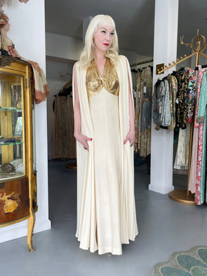 1972 Loris Azzaro Couture Ivory Silk-Jersey & Gold Metal Mesh Backless Gown w/ Cape