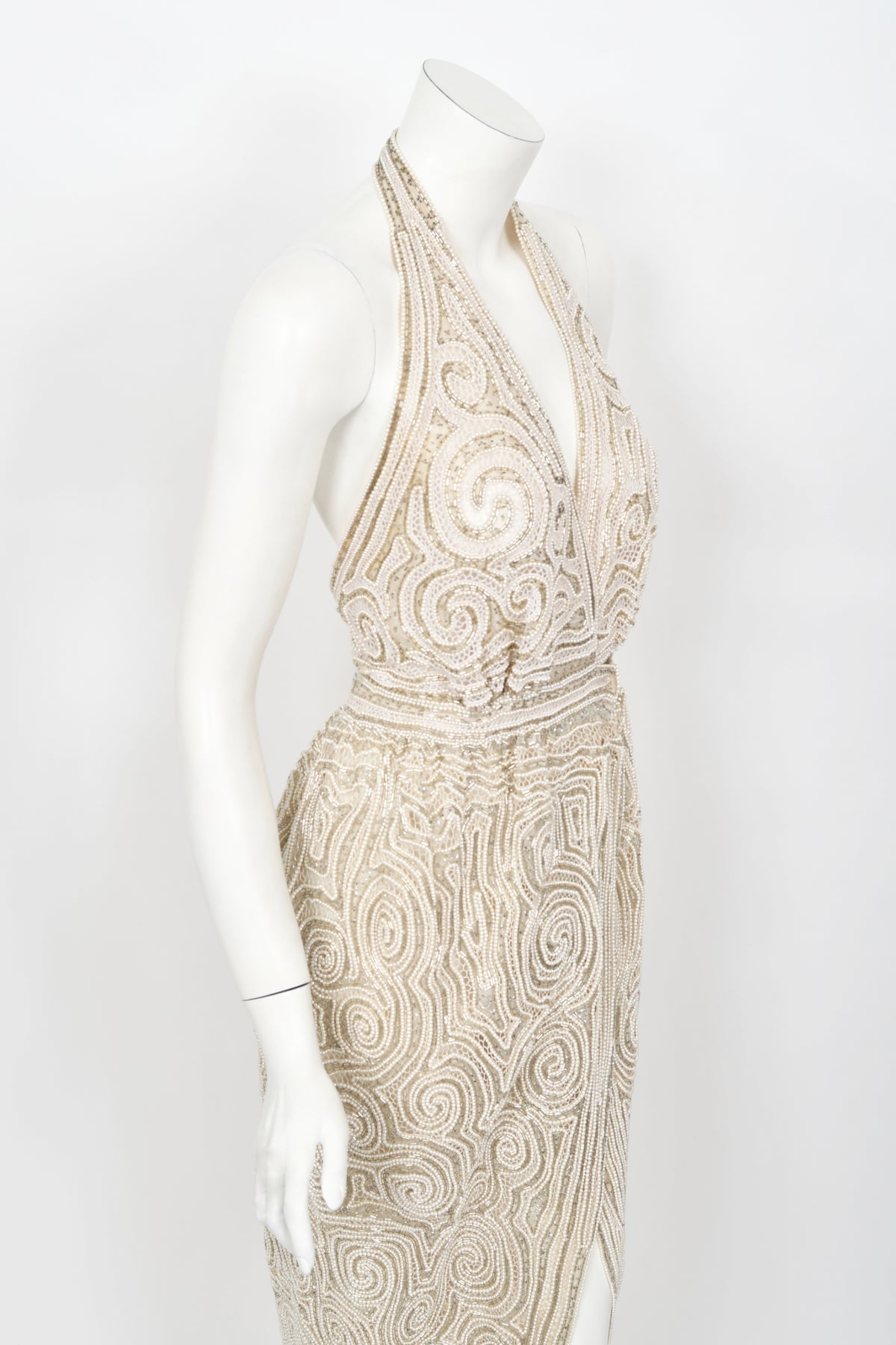 1970&#39;s Halston Couture Ivory Beaded Sheer Lace Backless Halter Wrap Gown