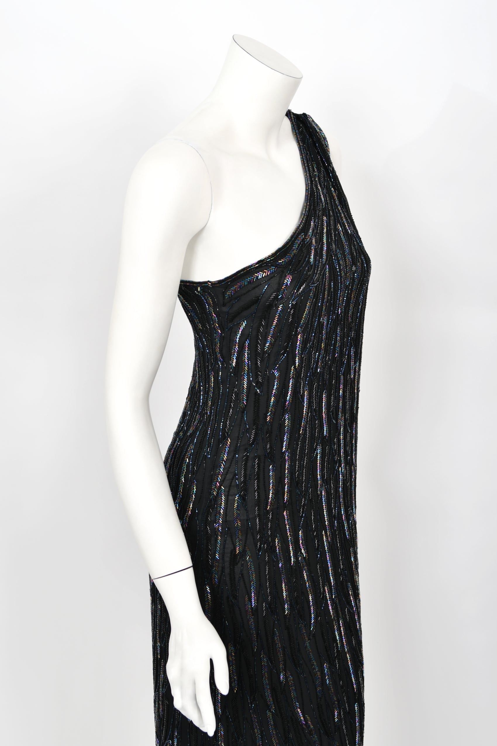 1970's Halston Couture Iridescent Beaded Black Silk One-Shoulder Dress 1970's Halston Couture Iridescent Beaded Black Silk One-Shoulder Dress