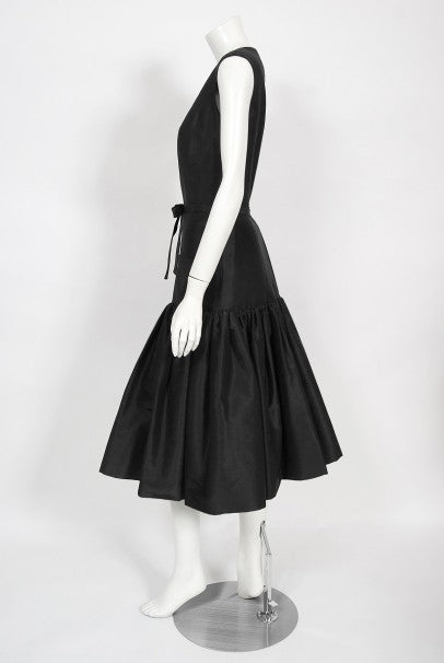 1956 Traina-Norell Couture Black Silk Belted Flounce Cocktail Dress