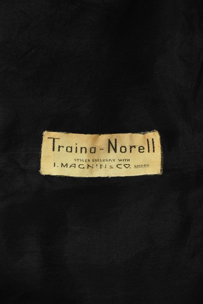 1956 Traina-Norell Couture Black Silk Belted Flounce Cocktail Dress